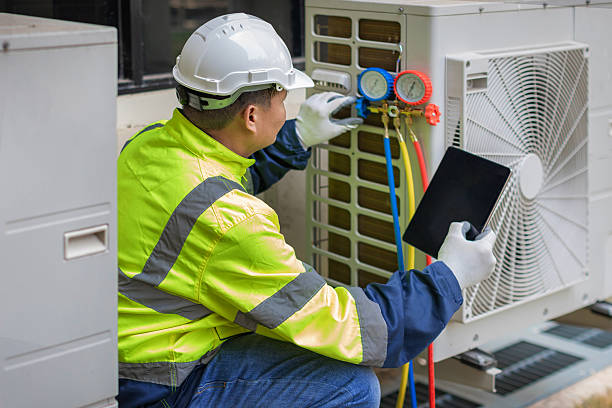 Professional Ductwork Repair technician working in The Plains, OH